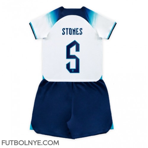 Camiseta Inglaterra John Stones #5 Primera Equipación para niños Mundial 2022 manga corta (+ pantalones cortos)